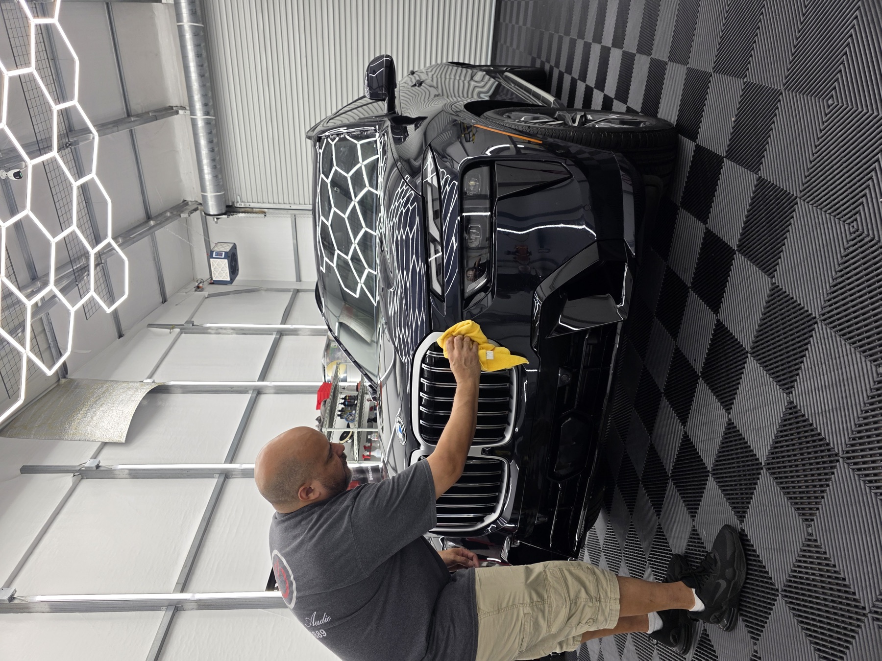 Final wipe-down after protection work.